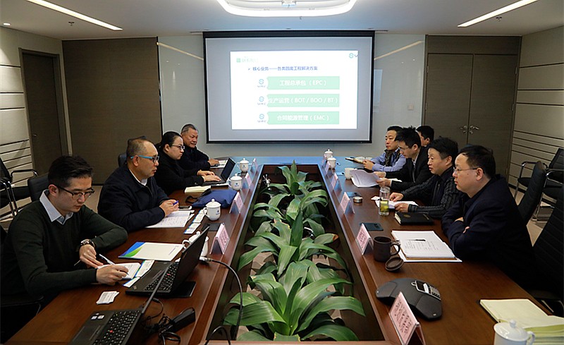 熊良虎会见中建材（北京）环保公司董事长泥卫东